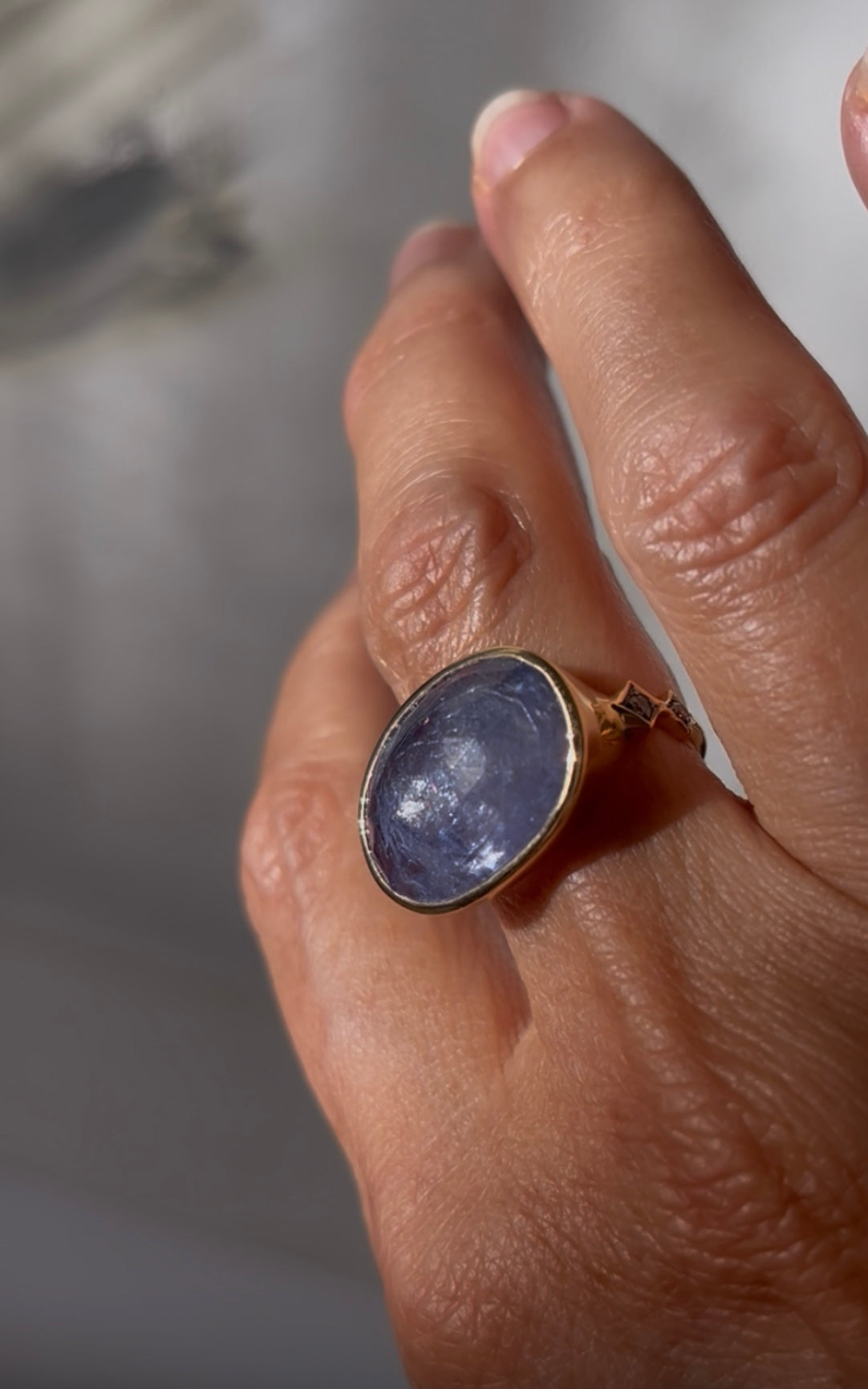 Oval Tanzanite Ring with Diamonds